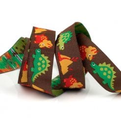 Dinosaurs on Brown - 5/8" - by the yard